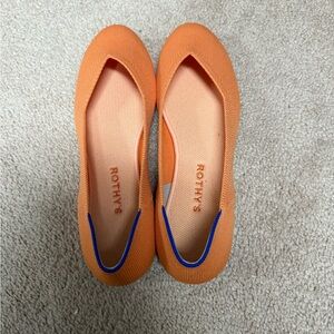 Rothy's Vibrant Orange Flats with Blue Trim